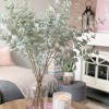 Tall stems of faux grey/green eucalyptus