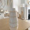 Natural large ceramic vase with rattan decoration