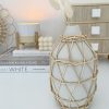Ceramic and rattan 'bottle' vase