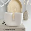 White stoneware glazed U vase