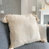 Large natural linen cushion with tassels
