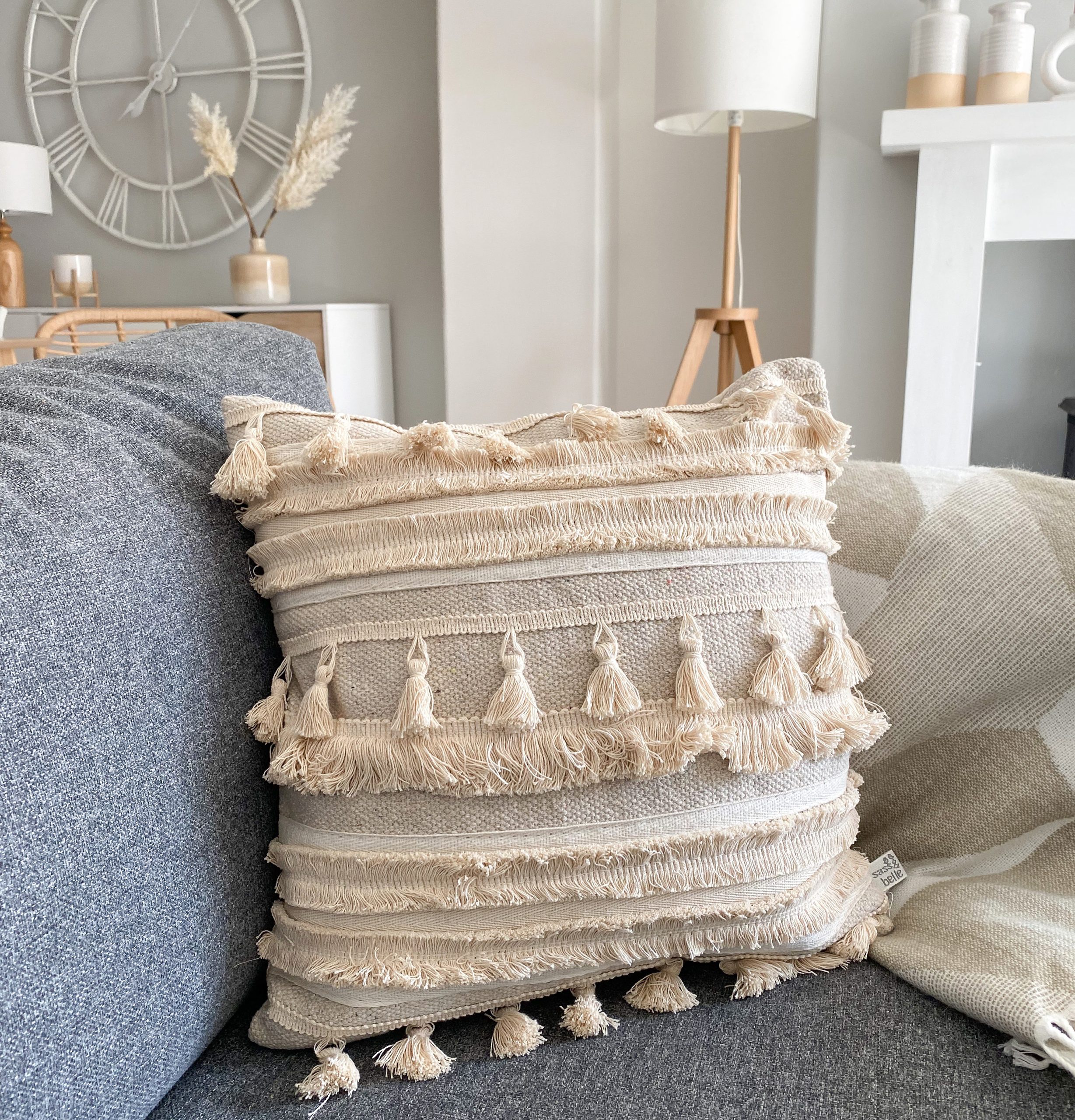 Grey tassel best sale cushion