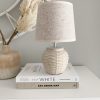 Basket weave ceramic lamp with linen shade