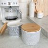 Spotty storage pot with wooden lid in light grey/dark grey