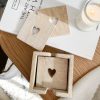 Set of six rustic wooden heart coasters