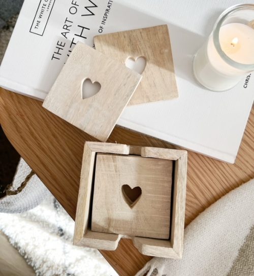 Set of six rustic wooden heart coasters