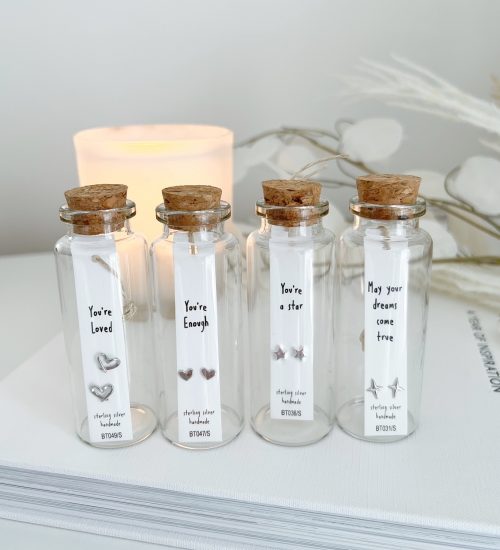 Sterling silver earrings in jar