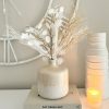 Faux bouquet of warm natural faux stems