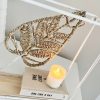 Small white metal shelf with leaf decoration - Image 2
