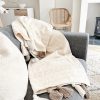 Natural textured throw with tassels