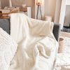Softest textured ivory snuggly throw
