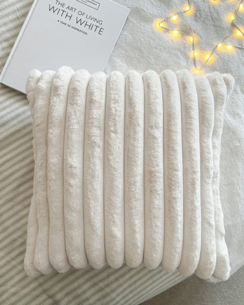 Luxury cream faux fur ribbed cushion