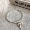 Silver bead bracelet with heart and pearl charm