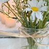 Large jar of faux daisies - Image 3