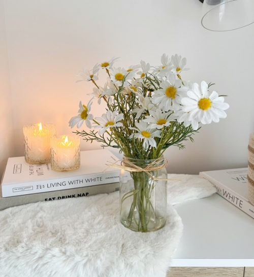 Large jar of faux daisies