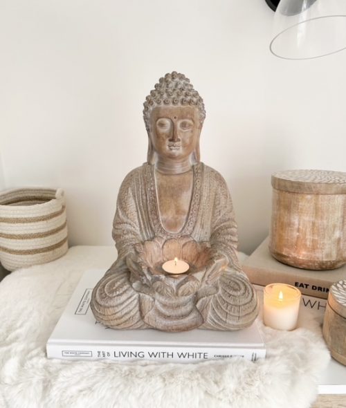 Large decorative buddha with candle holder