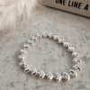 Small silver hearts with round beads bracelet