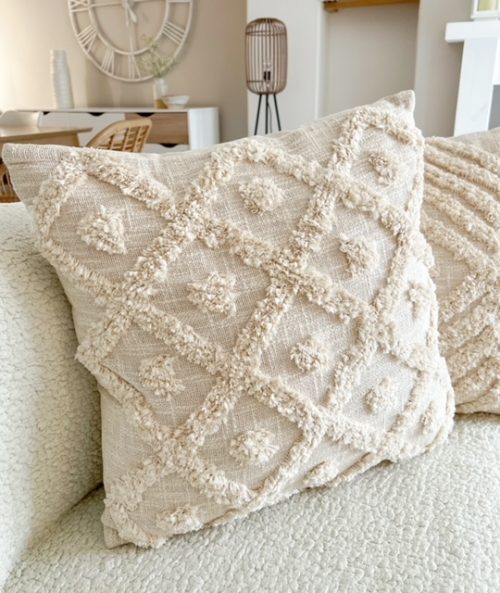 Oversized tufted spot cushion