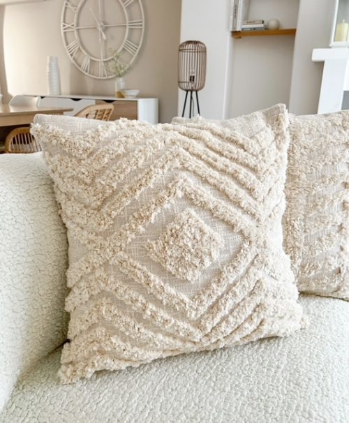 Oversized tufted diamond cushion