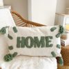 Loop embroidered 'Home' cushion