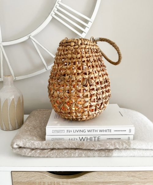 Woven lantern with glass votive and rope handle