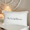 'This family believes' white pompom cushion - Image 3