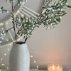 Stem of long faux glittered mistletoe