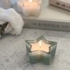 Sage green frosted star candle