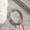Double bead bracelet with leaf decoration