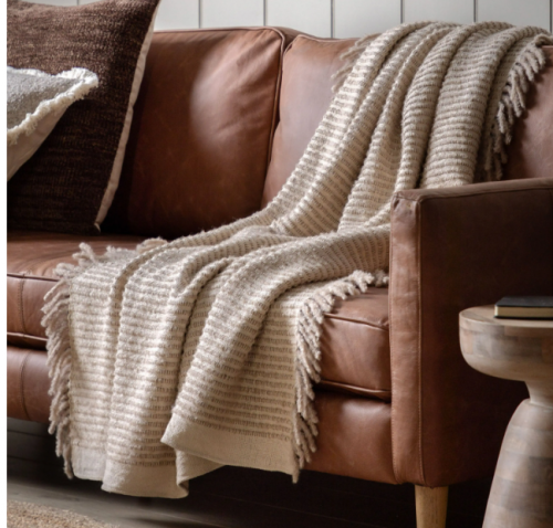 Cream fringe throw