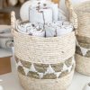 Woven decorative basket with handles