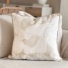 Natural abstract piped cushion