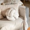 Large cream Nordic boucle knot cushion