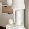 Textured base ceramic lamp with beige linen shade