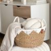 Round handled basket with white decorative edging